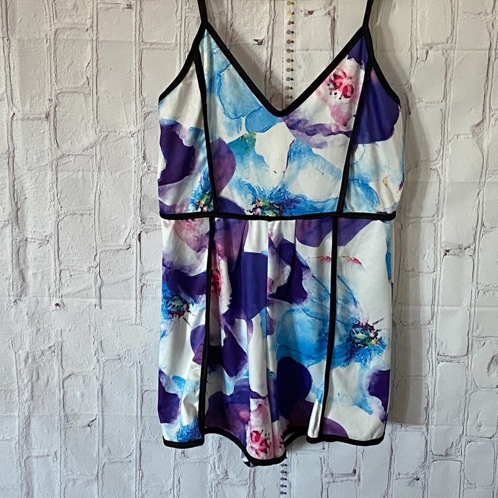 Jumpsuit or Romper Multi print floral cool for the summer/ fall season Size M